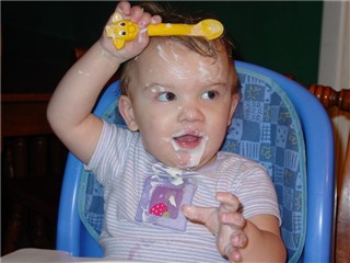 Ella eating yogurt