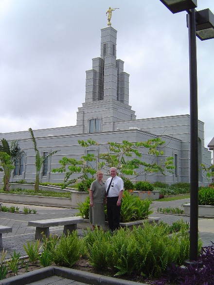 Elder and Sister Markham in front of the Accra Temple