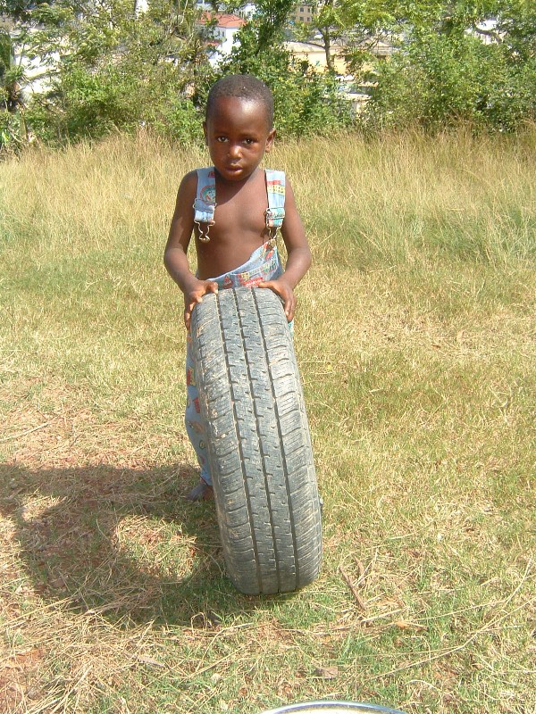 Boy with Tire